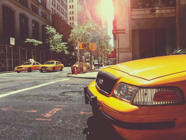 taxi cabs at intersection in NYC